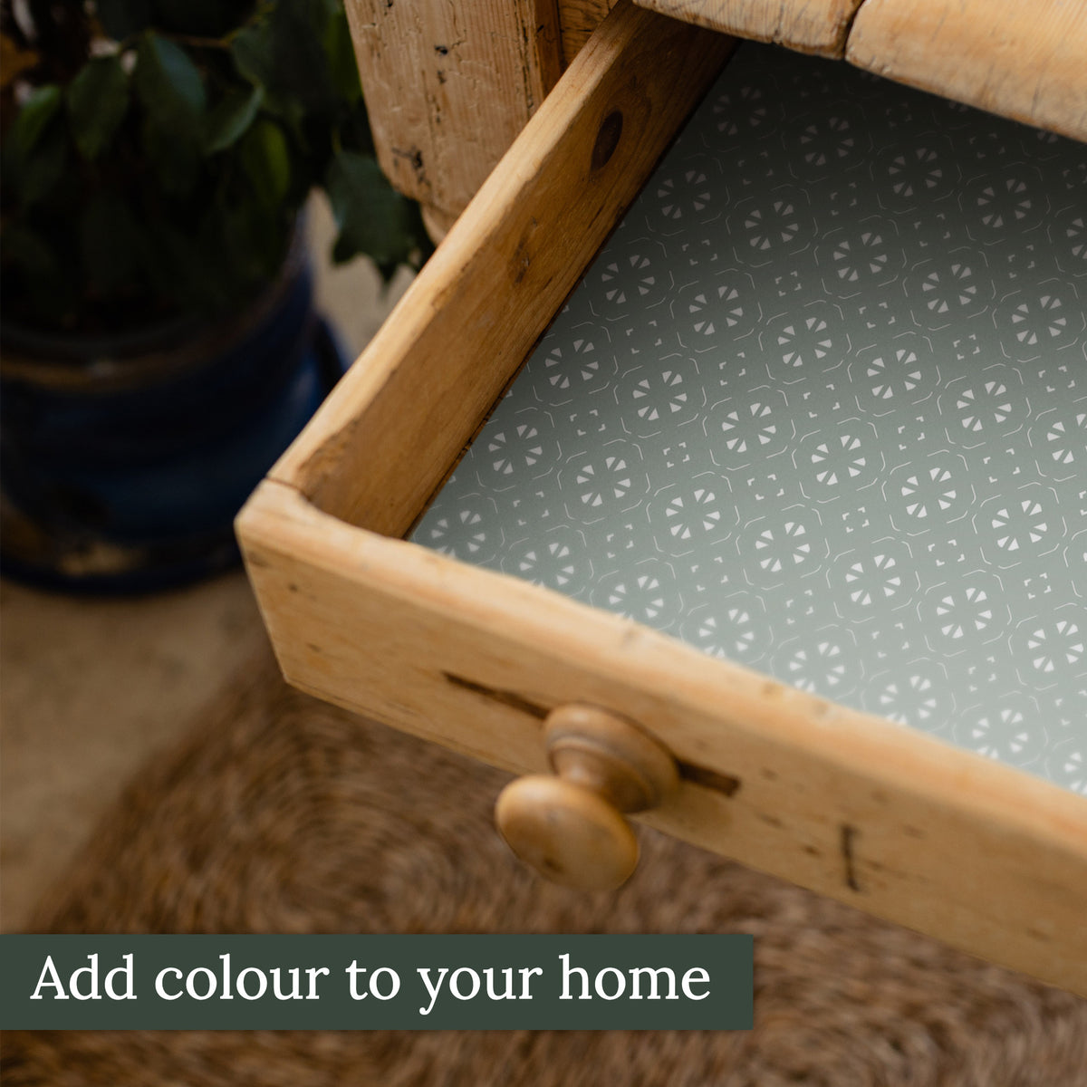 Aquamarine Geometric scented drawer liners lining a drawer