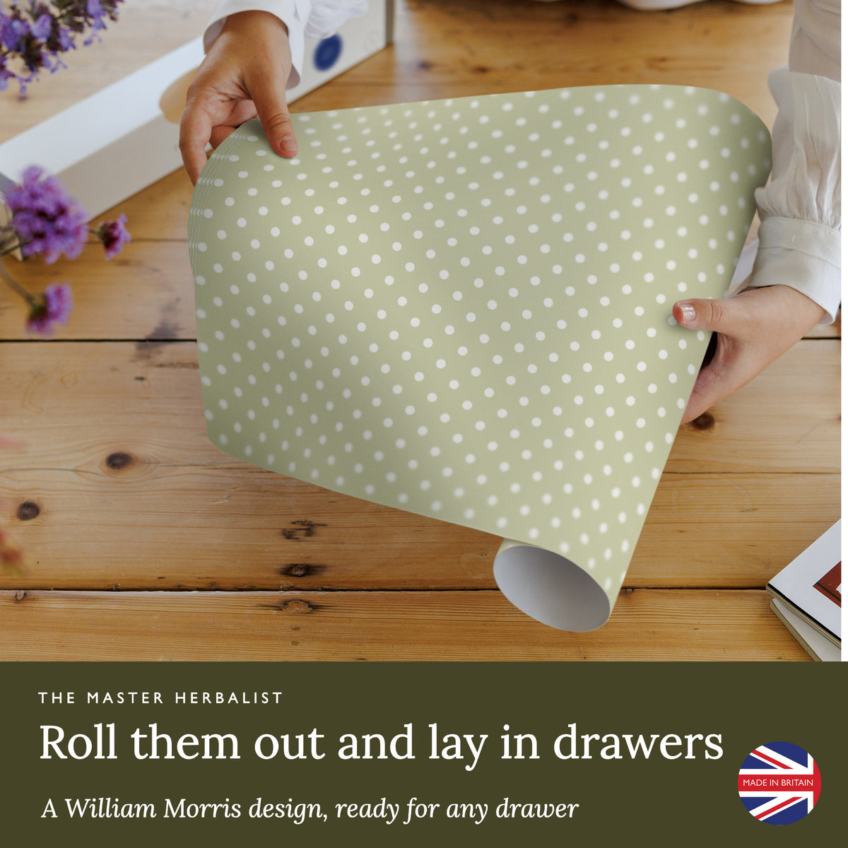 Roll out Sage Green Polka Dot wipe clean drawer liners and lay them in drawers