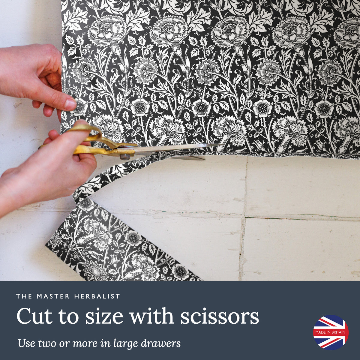 Cut Black William Morris Pinks + Roses liners to size with scissors; use two or more in large drawers