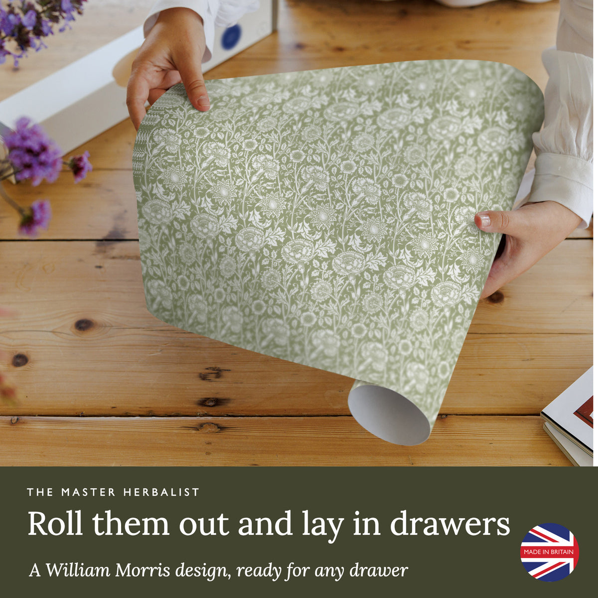 Roll out Sage Green William Morris Pinks + Roses wipe clean drawer liners and lay them in drawers